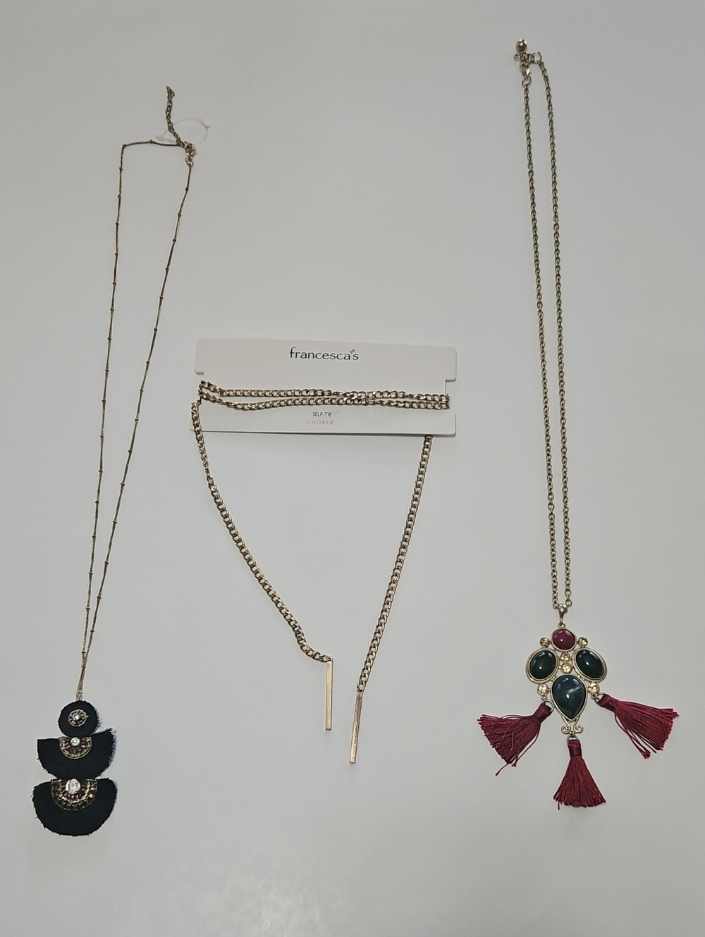 Francesca's Gold-Tone Necklace with Burgundy Tassels and Dark Green Stones